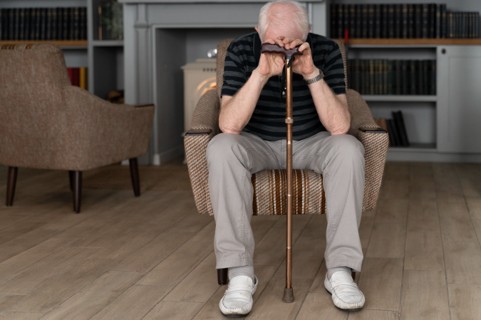 senior man missing and thinking about lost spouse