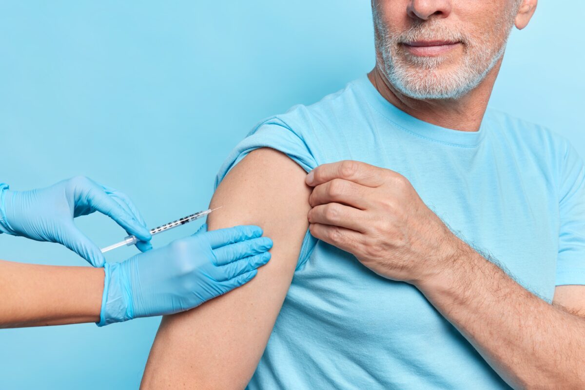 doctor-gives-shingles-vaccine-injection-to-elderly-patient