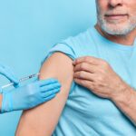 doctor-gives-shingles-vaccine-injection-to-elderly-patient